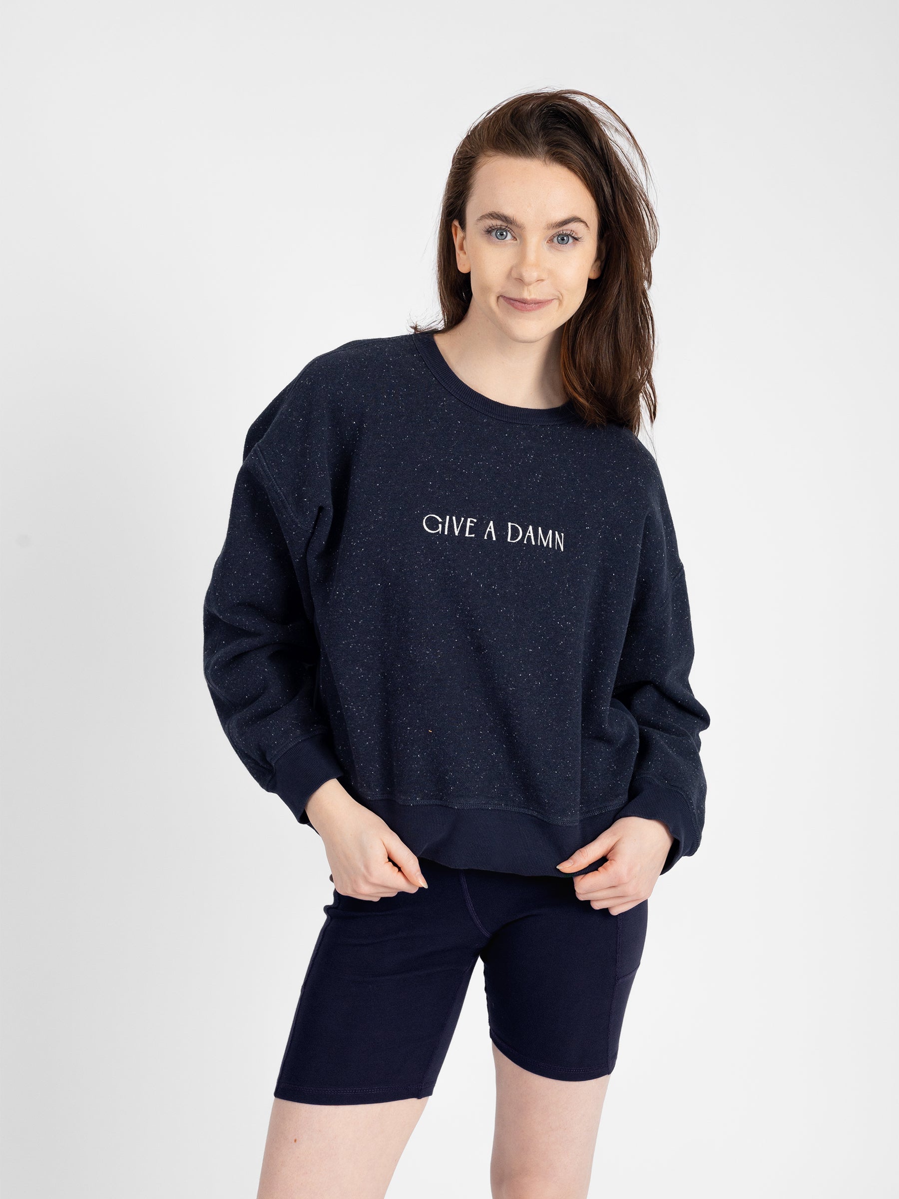 "GIVE A DAMN" pullover on-model front view, organic, skin-safe