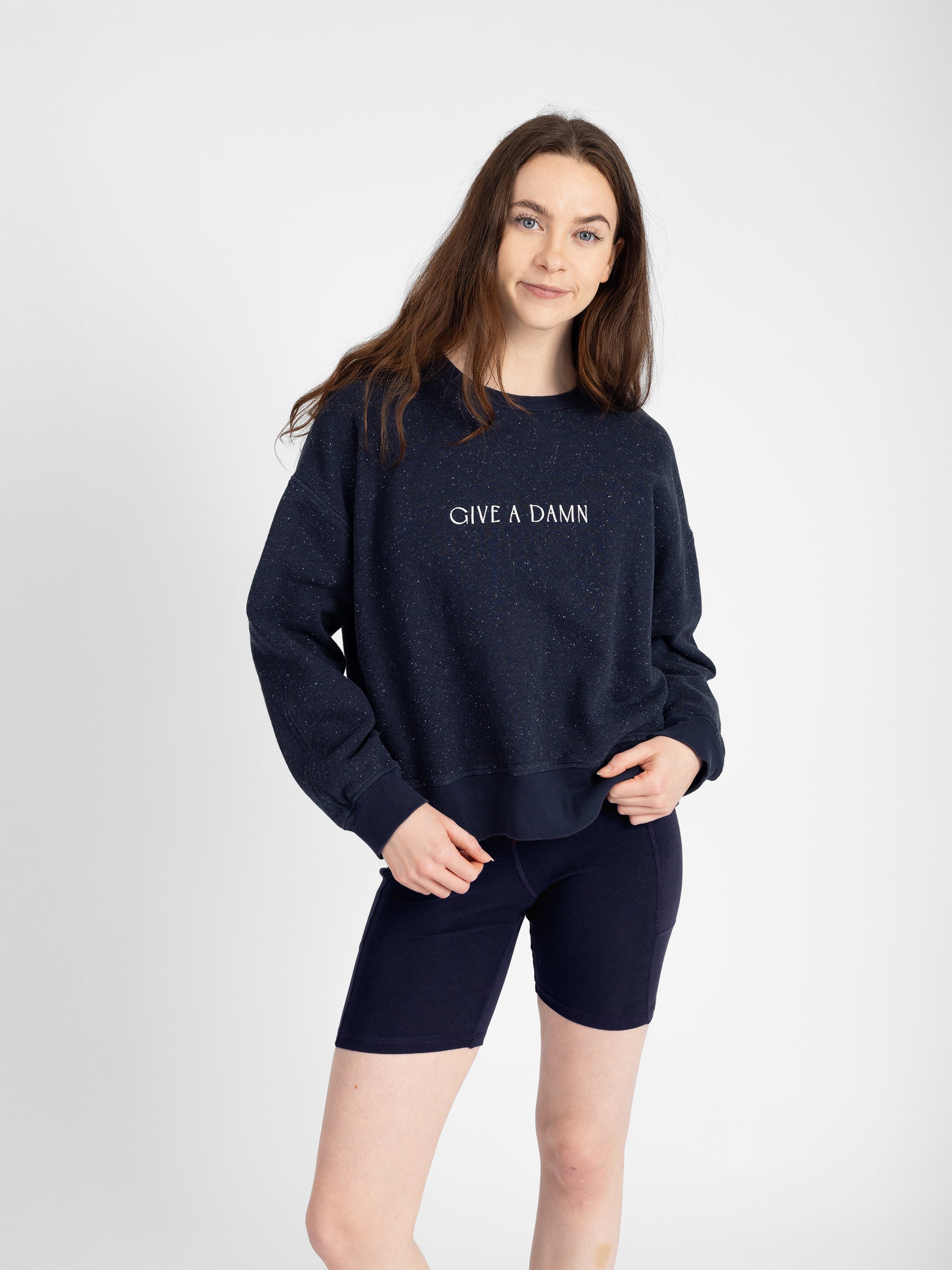 "GIVE A DAMN" embroidered pullover back view, organic cotton