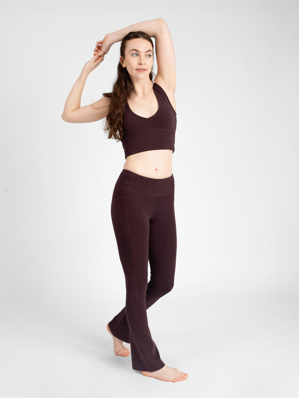 Full-length front view of the Espresso brown PlantTec organic cotton flare leggings with matching top