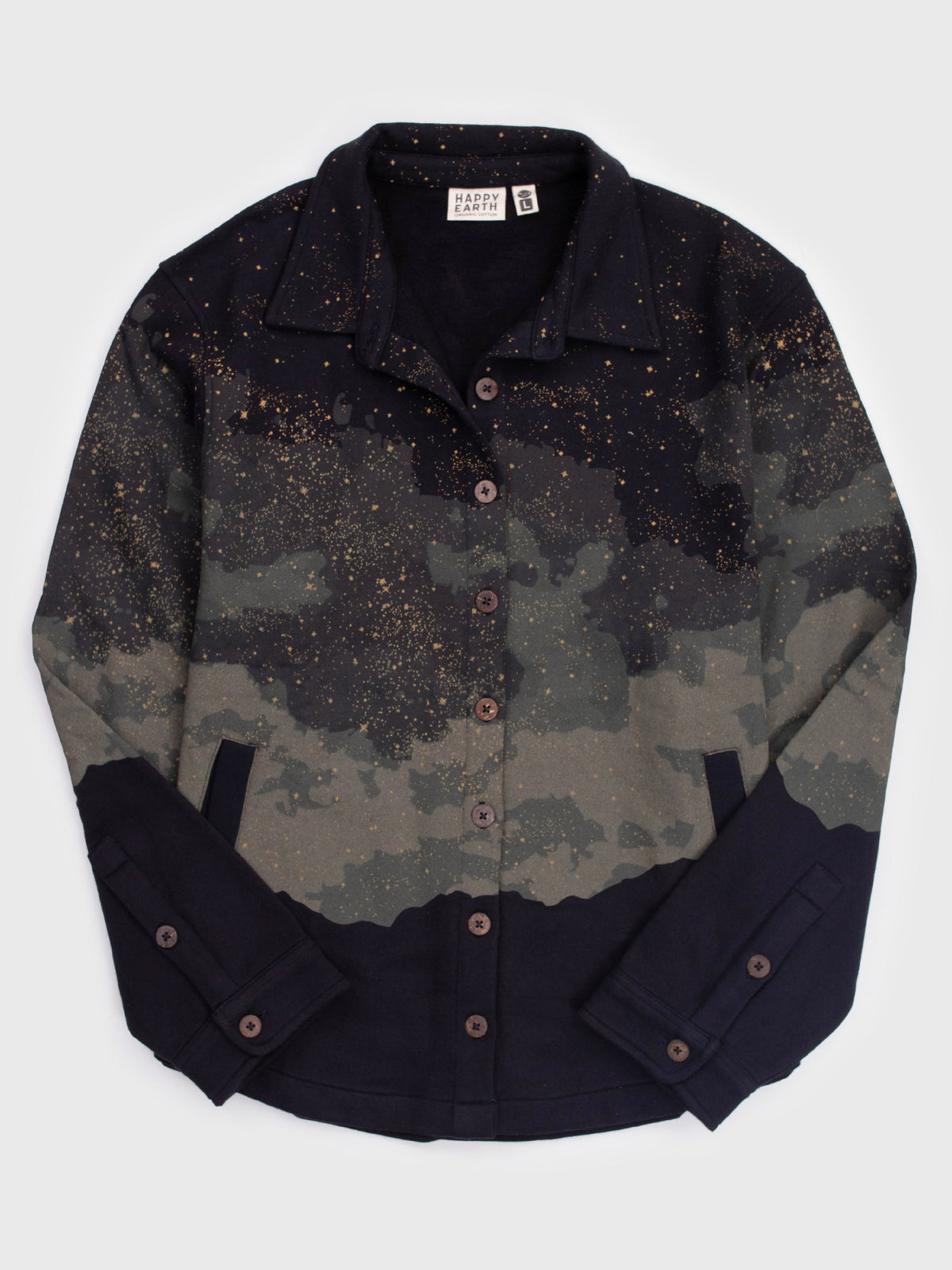 Flat lay of the Embercrest organic cotton blanket shirt in black, starry clouds over mountains, wooden buttons
