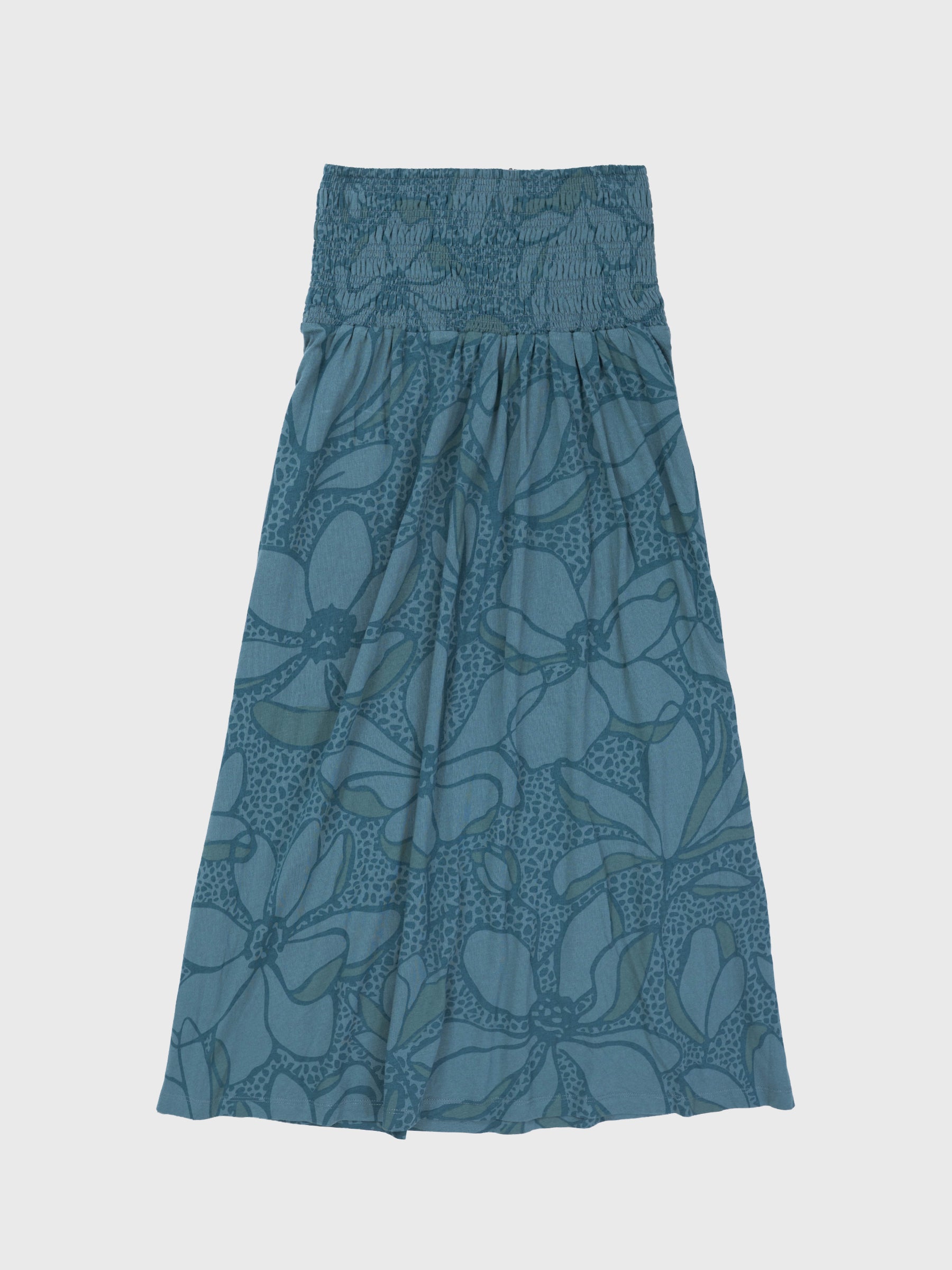 Oasis Smocked Skirt: Teal organic cotton maxi skirt with large floral print and wide smocked waistband.