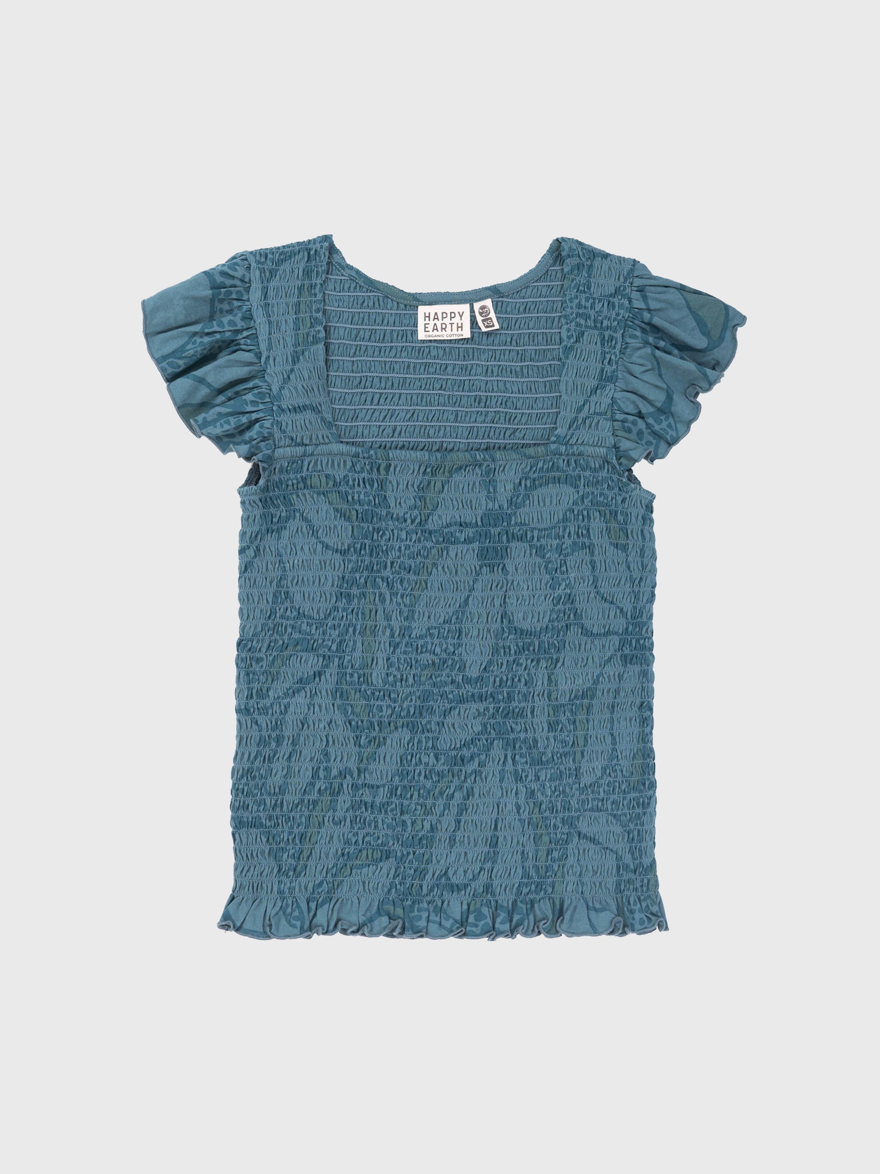 Teal smocked organic cotton top with square neckline, flutter cap sleeves, and ruffled hem.