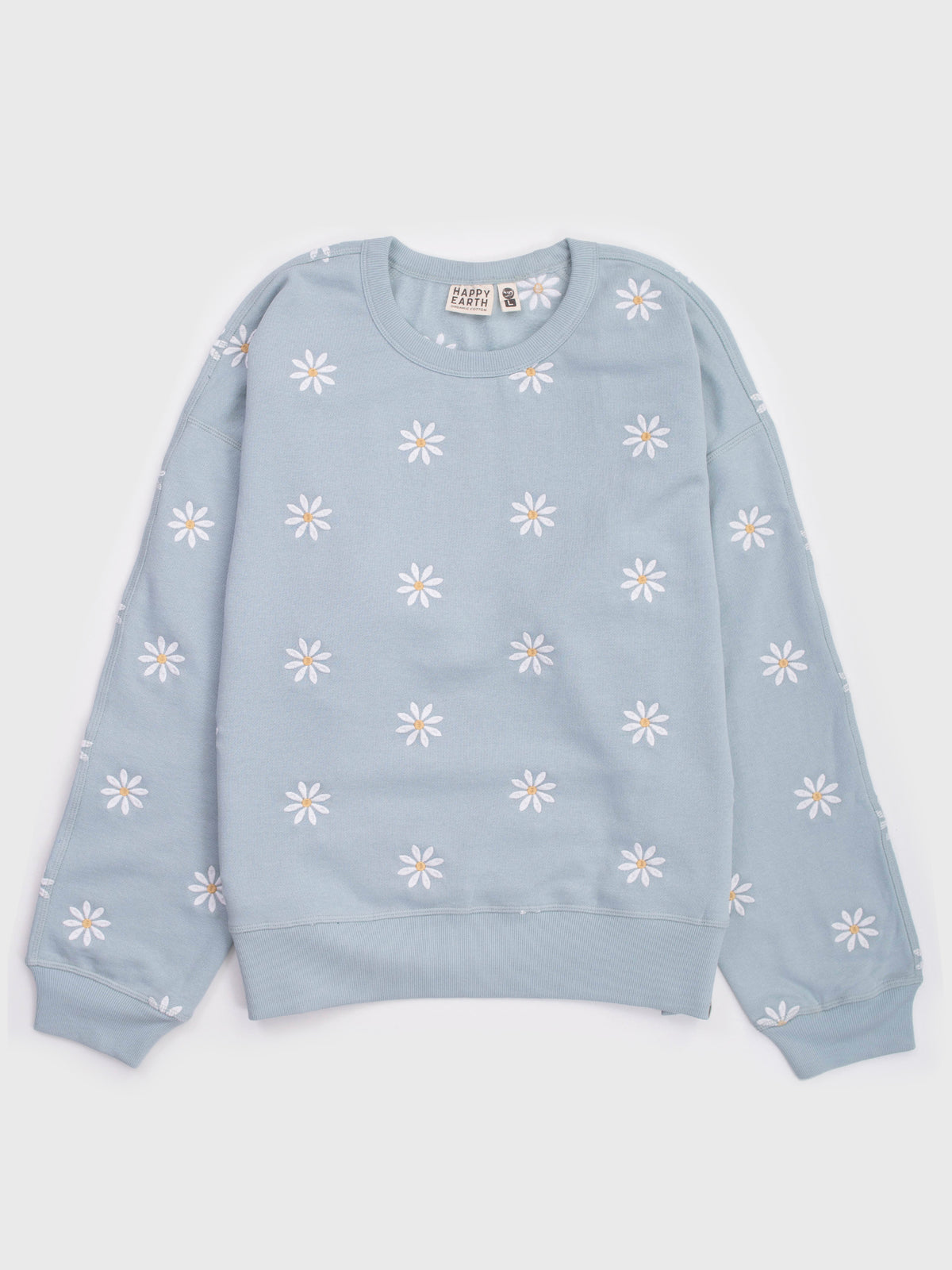 Flat lay of the Daisies organic cotton sweatshirt in light blue, embroidered all over with white daisies