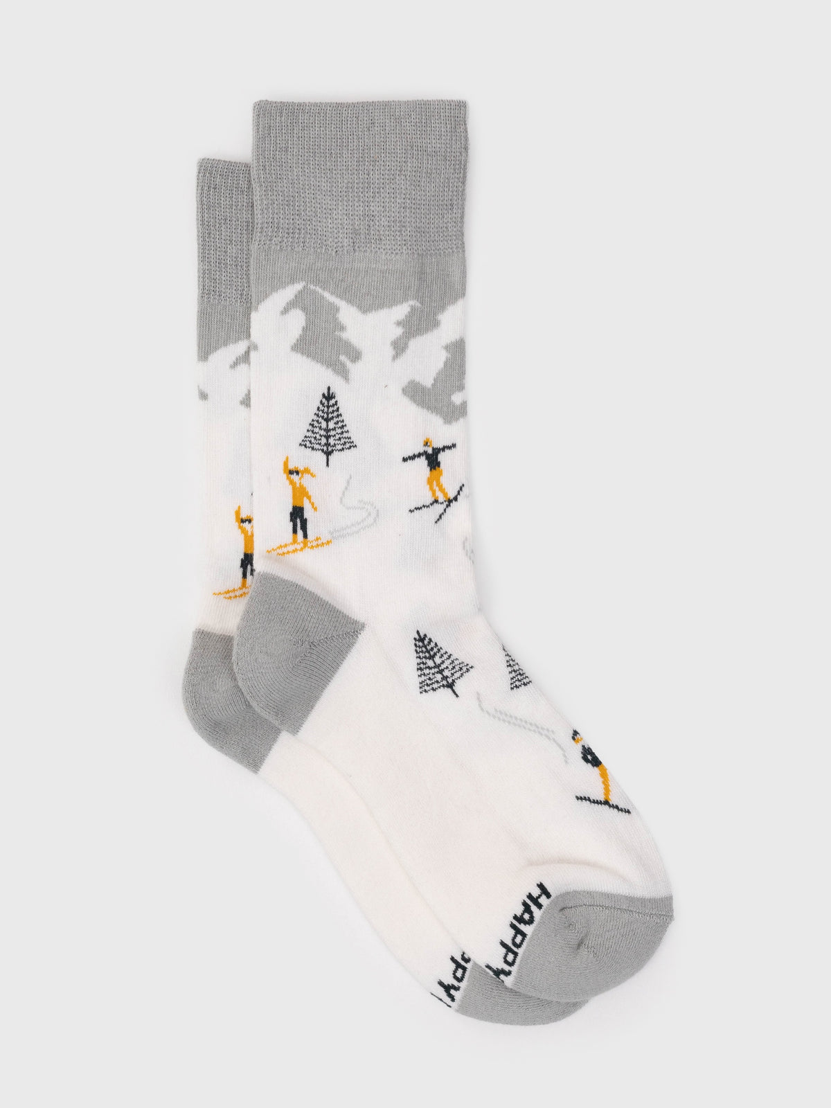 Flat lay of the Altitude organic cotton crew socks, skiers on white snowy mountains with gray cuff and heel