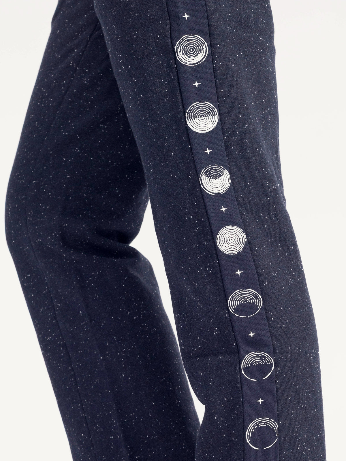 Close-up of the moon phase side stripe on the navy Moonshine organic cotton straight leg sweatpants
