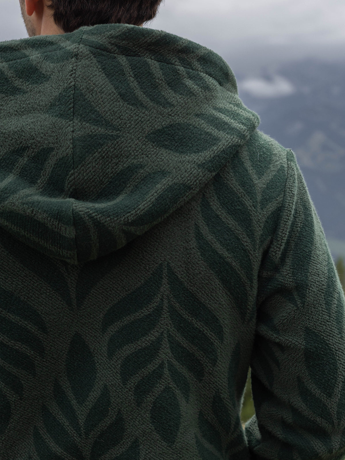 Close-up of the hood and tonal leaf pattern on the Verdant organic cotton sherpa zip hoodie