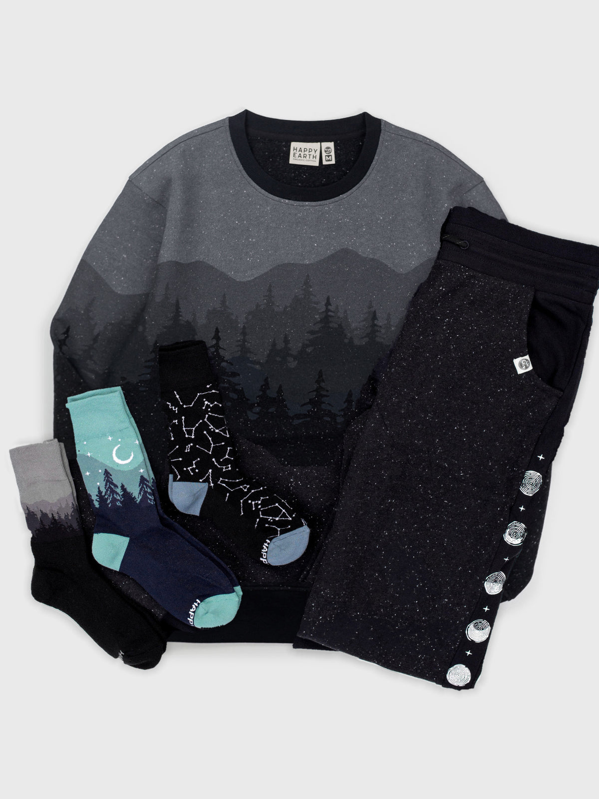 Dark Frost Pullover Bundle flat lay: Dark Frost organic cotton pullover, Dark Side joggers, and Dark Frost, Aurora and Constellations socks