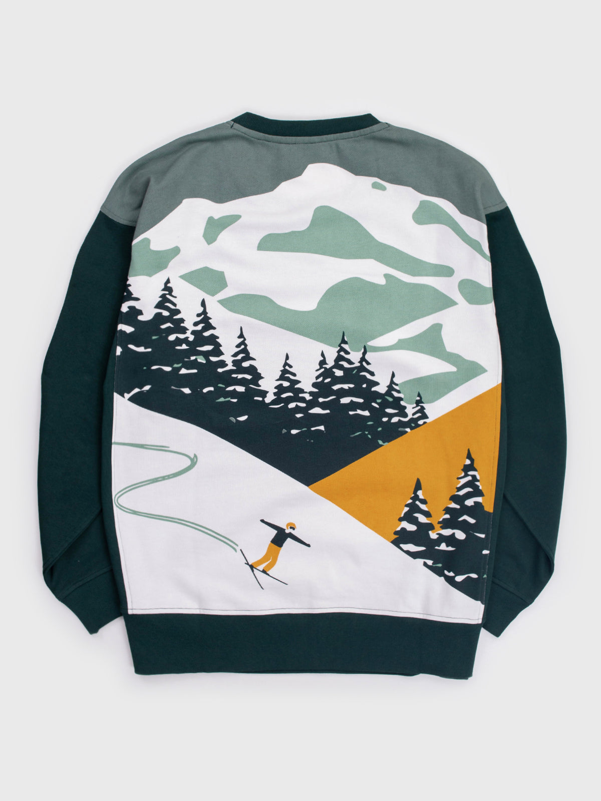 Flat lay of the back of the Powderbound organic cotton sweatshirt, retro skier on a snowy slope with pines and a gold mountainside