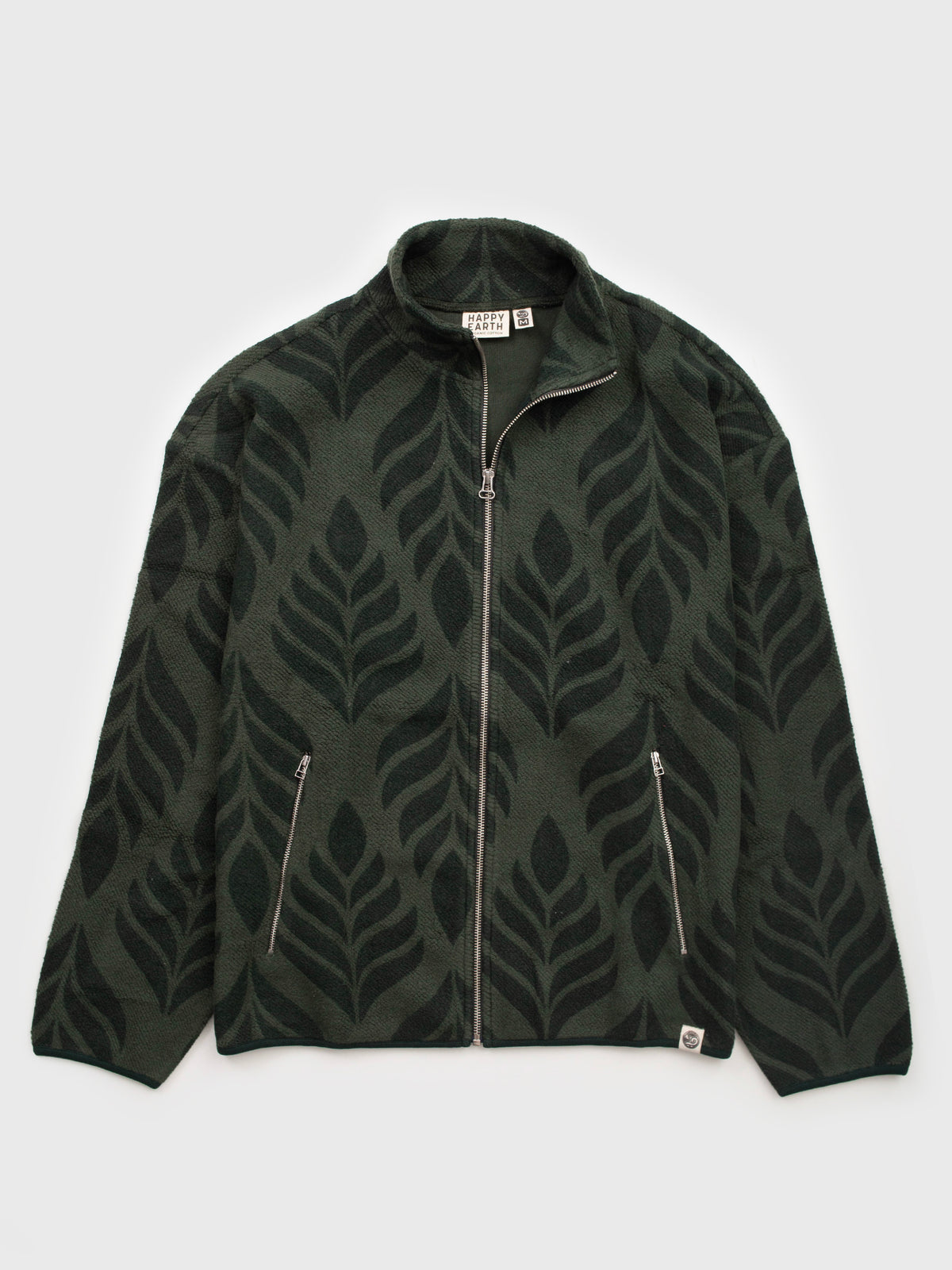 Flat lay of the Verdant organic cotton sherpa jacket in forest green, leaf pattern, stand collar and zip pockets