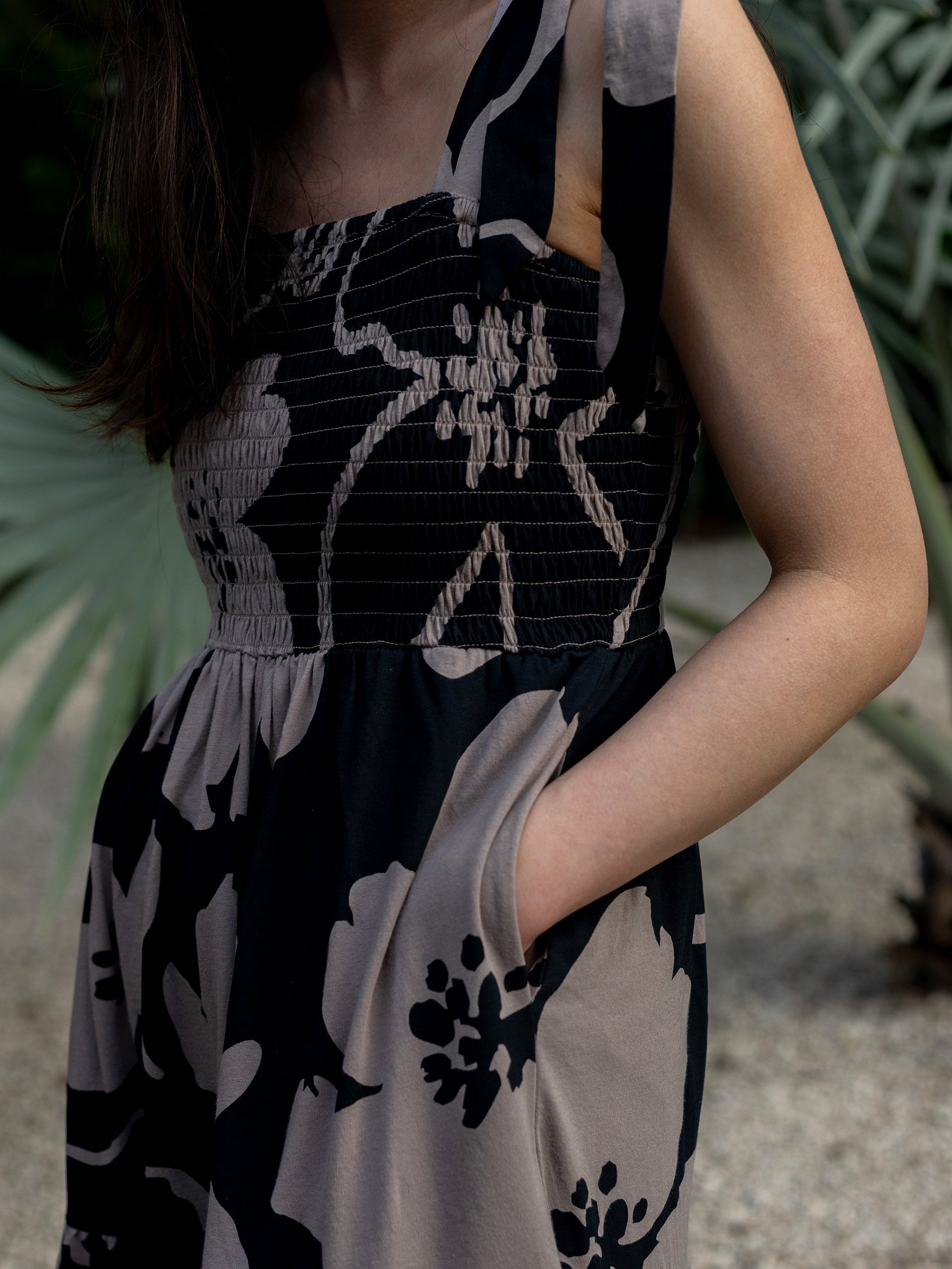 Evie Smocked Dress in Moonflower: black and taupe floral maxi with smocked bodice and pockets.