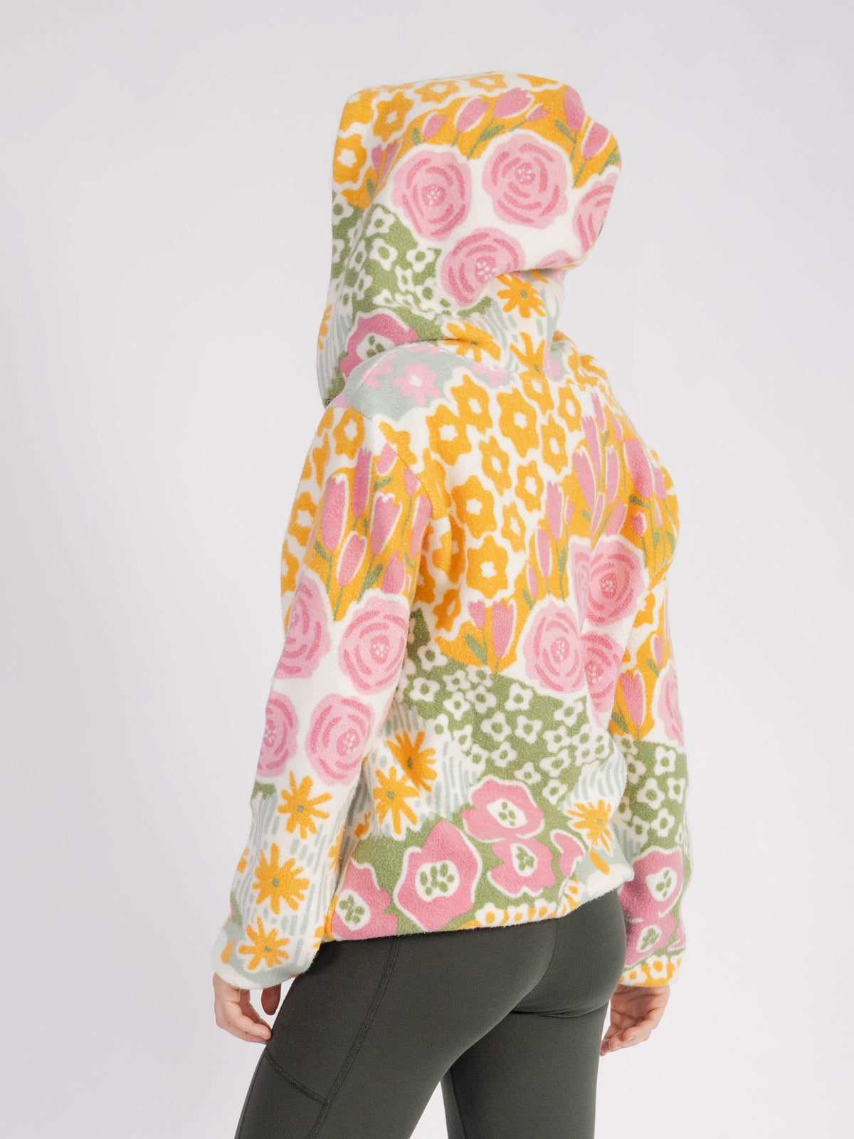 Back view of the Bouquet organic cotton sherpa zip hoodie, florals across back and hood